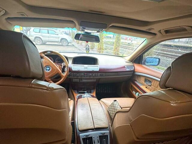 Білий БМВ 7 Серія, об'ємом двигуна 3 л та пробігом 375 тис. км за 5000 $, фото 2 на Automoto.ua