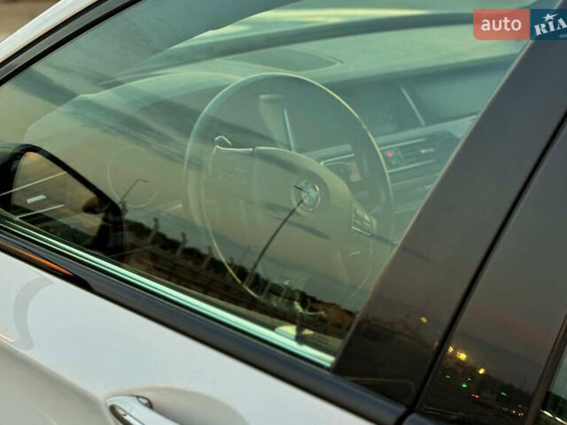 Белый БМВ 7 Серия, объемом двигателя 2.98 л и пробегом 190 тыс. км за 17500 $, фото 11 на Automoto.ua