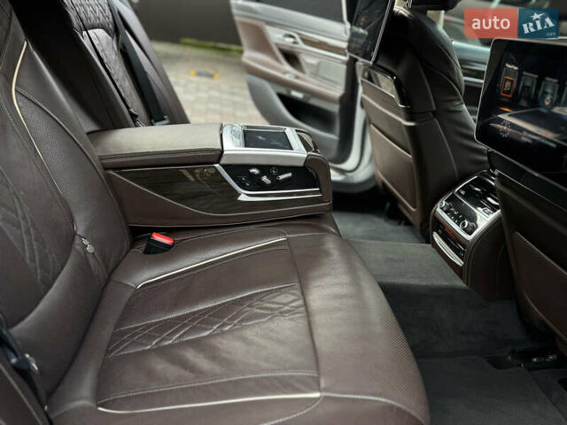 Белый БМВ 7 Серия, объемом двигателя 2.99 л и пробегом 124 тыс. км за 45000 $, фото 6 на Automoto.ua