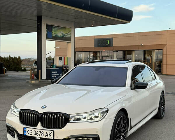 Белый БМВ 7 Серия, объемом двигателя 4.4 л и пробегом 126 тыс. км за 27777 $, фото 2 на Automoto.ua