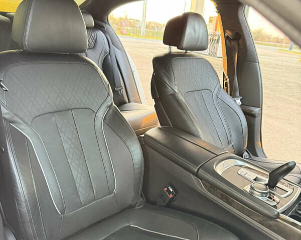 Белый БМВ 7 Серия, объемом двигателя 4.4 л и пробегом 126 тыс. км за 27777 $, фото 30 на Automoto.ua