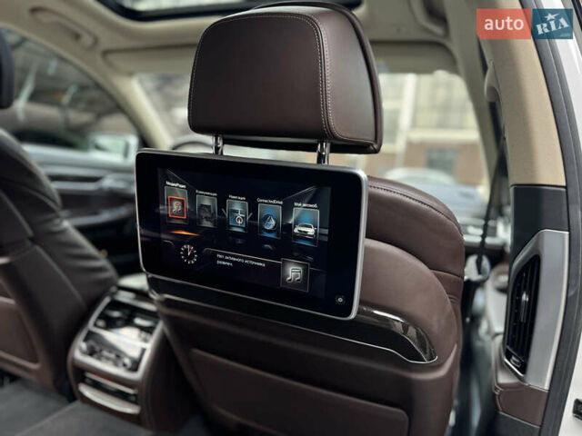 Белый БМВ 7 Серия, объемом двигателя 2.99 л и пробегом 124 тыс. км за 45000 $, фото 9 на Automoto.ua