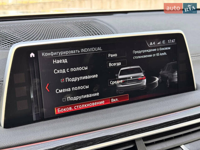 Белый БМВ 7 Серия, объемом двигателя 3 л и пробегом 159 тыс. км за 32000 $, фото 27 на Automoto.ua