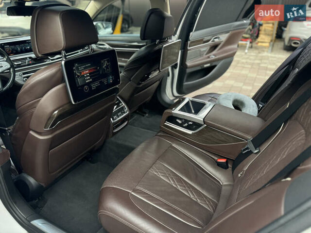 Белый БМВ 7 Серия, объемом двигателя 2.99 л и пробегом 124 тыс. км за 45000 $, фото 7 на Automoto.ua