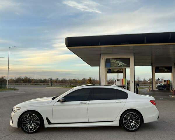 Белый БМВ 7 Серия, объемом двигателя 4.4 л и пробегом 126 тыс. км за 27777 $, фото 7 на Automoto.ua