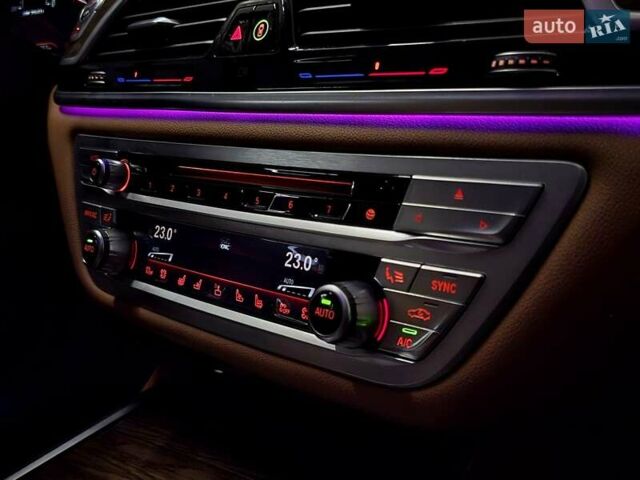 Белый БМВ 7 Серия, объемом двигателя 3 л и пробегом 161 тыс. км за 29979 $, фото 35 на Automoto.ua