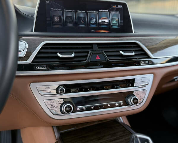 Білий БМВ 7 Серія, об'ємом двигуна 2.98 л та пробігом 142 тис. км за 25700 $, фото 22 на Automoto.ua