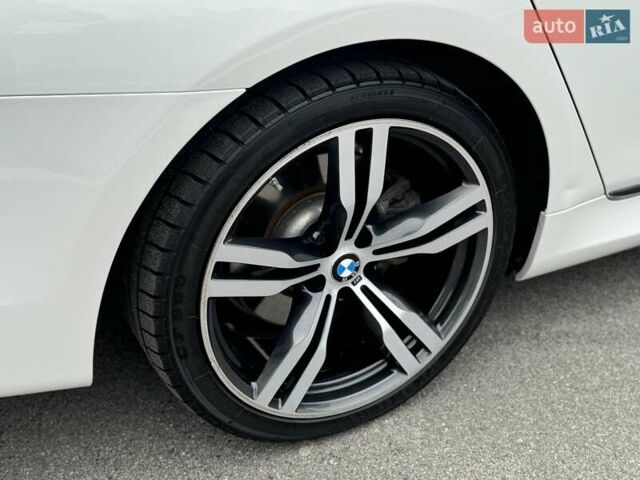 Белый БМВ 7 Серия, объемом двигателя 3 л и пробегом 78 тыс. км за 29700 $, фото 24 на Automoto.ua