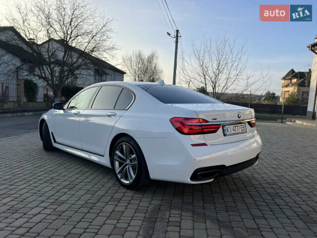 Белый БМВ 7 Серия, объемом двигателя 2.99 л и пробегом 200 тыс. км за 35000 $, фото 4 на Automoto.ua