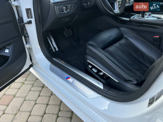 Белый БМВ 7 Серия, объемом двигателя 2.99 л и пробегом 200 тыс. км за 35000 $, фото 32 на Automoto.ua