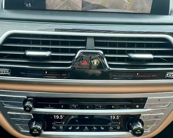 Белый БМВ 7 Серия, объемом двигателя 4.39 л и пробегом 130 тыс. км за 29888 $, фото 23 на Automoto.ua