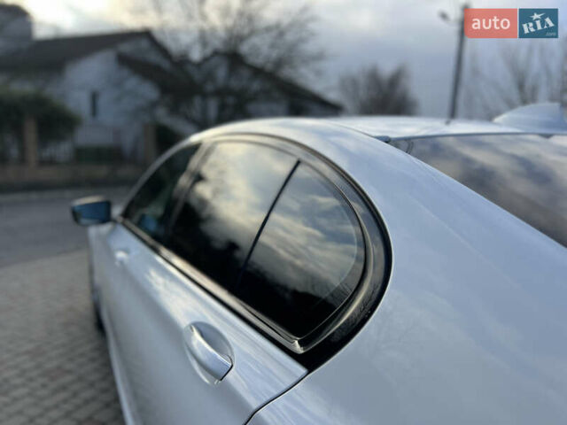 Белый БМВ 7 Серия, объемом двигателя 2.99 л и пробегом 200 тыс. км за 35000 $, фото 29 на Automoto.ua