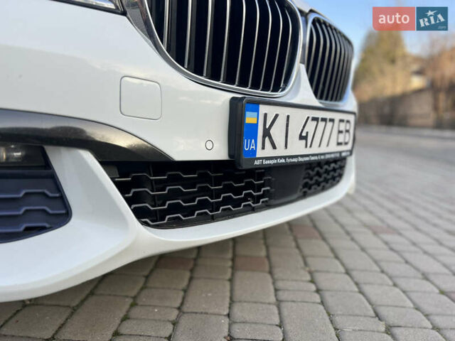 Белый БМВ 7 Серия, объемом двигателя 2.99 л и пробегом 200 тыс. км за 35000 $, фото 19 на Automoto.ua