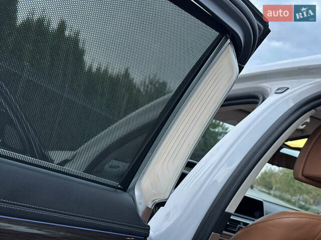 Белый БМВ 7 Серия, объемом двигателя 2 л и пробегом 70 тыс. км за 35500 $, фото 50 на Automoto.ua