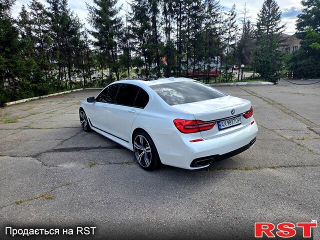 Білий БМВ 7 Серія, об'ємом двигуна 3 л та пробігом 90 тис. км за 40000 $, фото 2 на Automoto.ua