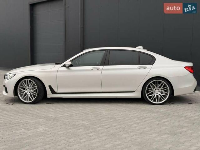 Белый БМВ 7 Серия, объемом двигателя 3 л и пробегом 113 тыс. км за 28440 $, фото 4 на Automoto.ua