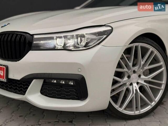 Белый БМВ 7 Серия, объемом двигателя 3 л и пробегом 113 тыс. км за 28440 $, фото 3 на Automoto.ua
