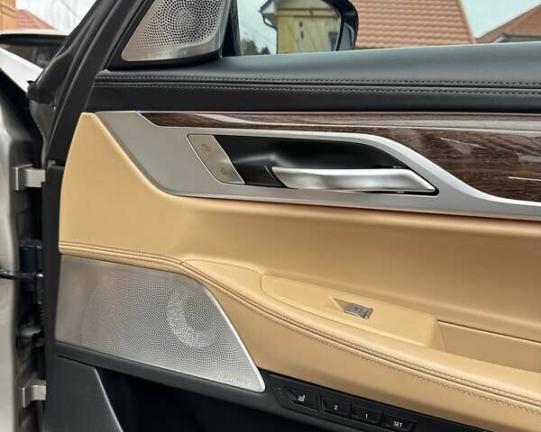 Бежевый БМВ 7 Серия, объемом двигателя 4.39 л и пробегом 129 тыс. км за 48499 $, фото 29 на Automoto.ua