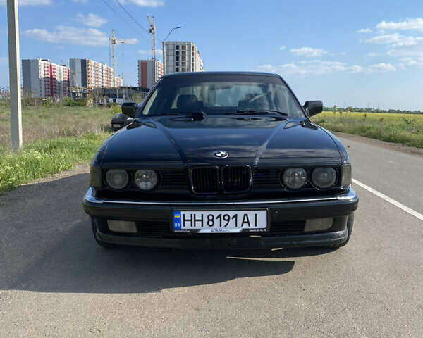 Черный БМВ 7 Серия, объемом двигателя 3.4 л и пробегом 100 тыс. км за 2150 $, фото 1 на Automoto.ua