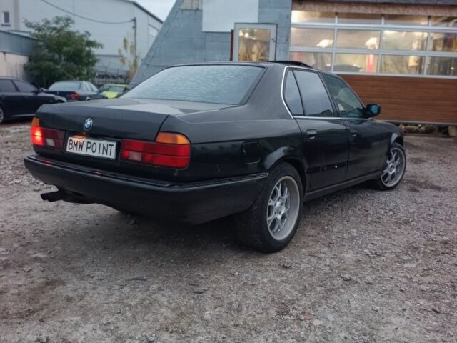 Черный БМВ 7 Серия, объемом двигателя 3.5 л и пробегом 333 тыс. км за 1600 $, фото 1 на Automoto.ua