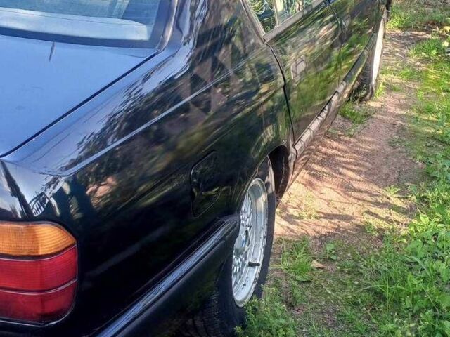 Черный БМВ 7 Серия, объемом двигателя 3 л и пробегом 390 тыс. км за 2500 $, фото 4 на Automoto.ua