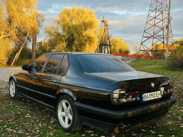 Черный БМВ 7 Серия, объемом двигателя 3 л и пробегом 450 тыс. км за 4500 $, фото 1 на Automoto.ua