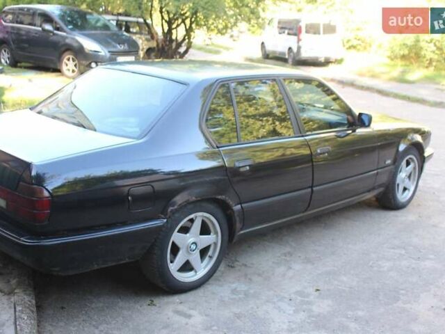 Черный БМВ 7 Серия, объемом двигателя 3 л и пробегом 430 тыс. км за 4700 $, фото 1 на Automoto.ua