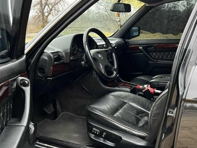 Черный БМВ 7 Серия, объемом двигателя 3 л и пробегом 450 тыс. км за 2200 $, фото 12 на Automoto.ua