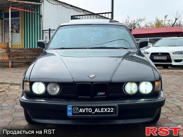 Черный БМВ 7 Серия, объемом двигателя 3.5 л и пробегом 300 тыс. км за 2499 $, фото 1 на Automoto.ua