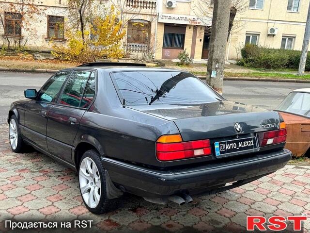Черный БМВ 7 Серия, объемом двигателя 3.5 л и пробегом 300 тыс. км за 2499 $, фото 6 на Automoto.ua