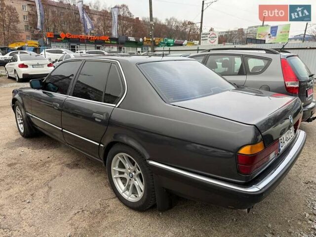 Черный БМВ 7 Серия, объемом двигателя 3 л и пробегом 350 тыс. км за 2500 $, фото 1 на Automoto.ua
