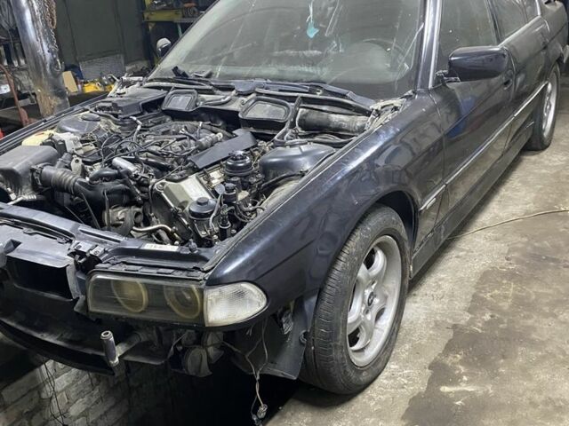 Чорний БМВ 7 Серія, об'ємом двигуна 4 л та пробігом 396 тис. км за 1999 $, фото 1 на Automoto.ua