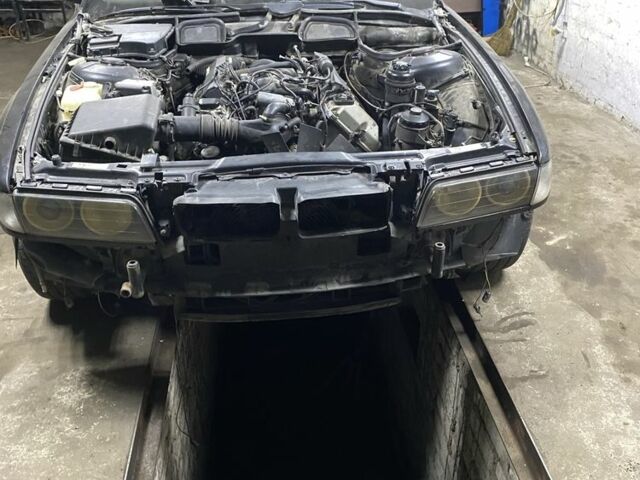 Чорний БМВ 7 Серія, об'ємом двигуна 4 л та пробігом 396 тис. км за 1999 $, фото 2 на Automoto.ua