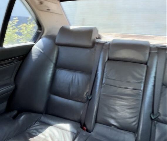 Чорний БМВ 7 Серія, об'ємом двигуна 4 л та пробігом 396 тис. км за 1999 $, фото 8 на Automoto.ua