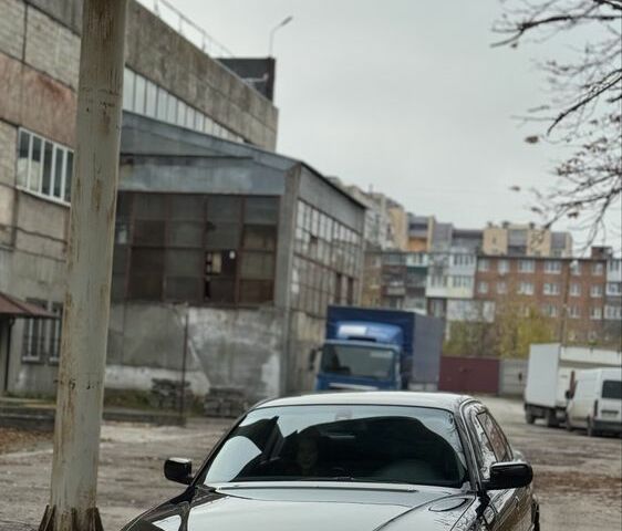 Черный БМВ 7 Серия, объемом двигателя 3 л и пробегом 480 тыс. км за 4950 $, фото 1 на Automoto.ua