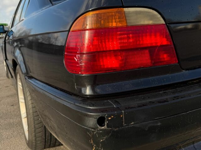 Чорний БМВ 7 Серія, об'ємом двигуна 5.4 л та пробігом 513 тис. км за 5100 $, фото 4 на Automoto.ua