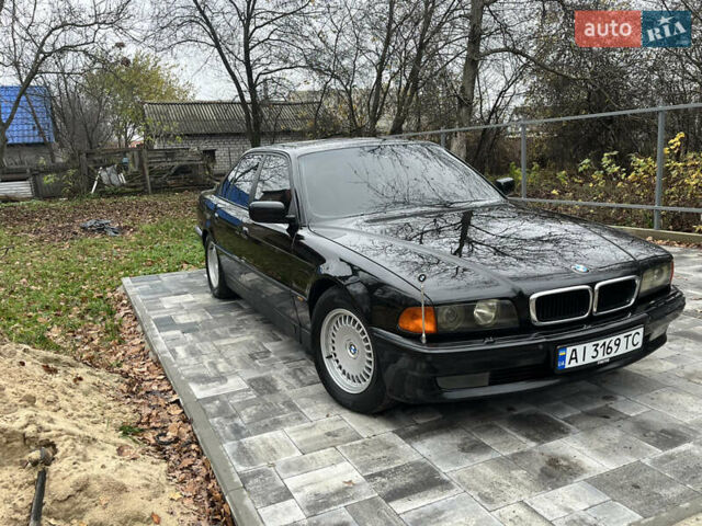 Чорний БМВ 7 Серія, об'ємом двигуна 3.5 л та пробігом 450 тис. км за 6500 $, фото 9 на Automoto.ua