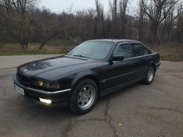 Черный БМВ 7 Серия, объемом двигателя 3 л и пробегом 248 тыс. км за 4000 $, фото 1 на Automoto.ua