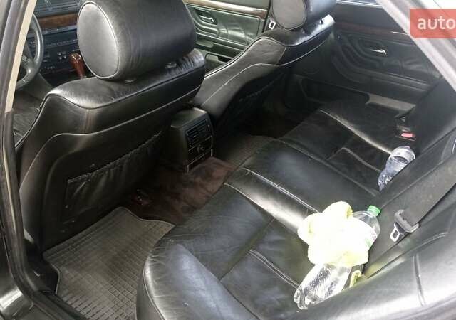 Черный БМВ 7 Серия, объемом двигателя 4 л и пробегом 507 тыс. км за 2999 $, фото 2 на Automoto.ua