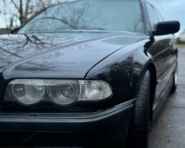 Чорний БМВ 7 Серія, об'ємом двигуна 3 л та пробігом 572 тис. км за 5200 $, фото 2 на Automoto.ua