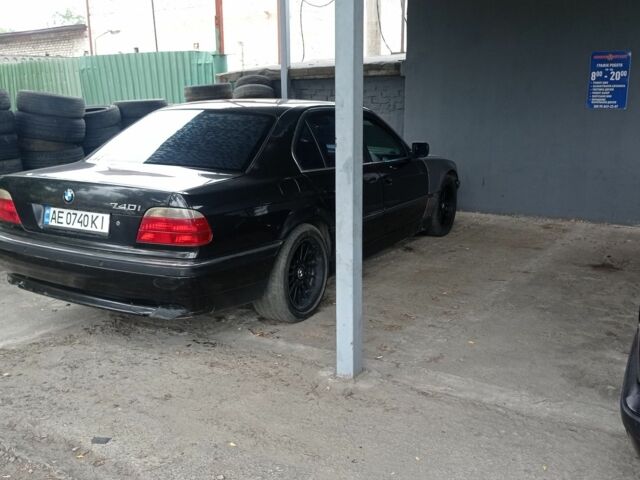 Черный БМВ 7 Серия, объемом двигателя 4 л и пробегом 510 тыс. км за 3450 $, фото 1 на Automoto.ua