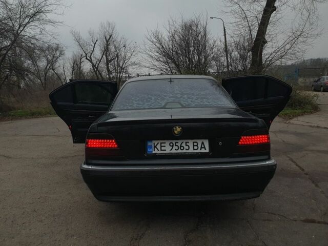 Черный БМВ 7 Серия, объемом двигателя 3 л и пробегом 248 тыс. км за 4000 $, фото 2 на Automoto.ua