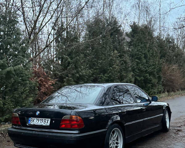 Чорний БМВ 7 Серія, об'ємом двигуна 3 л та пробігом 572 тис. км за 5200 $, фото 5 на Automoto.ua