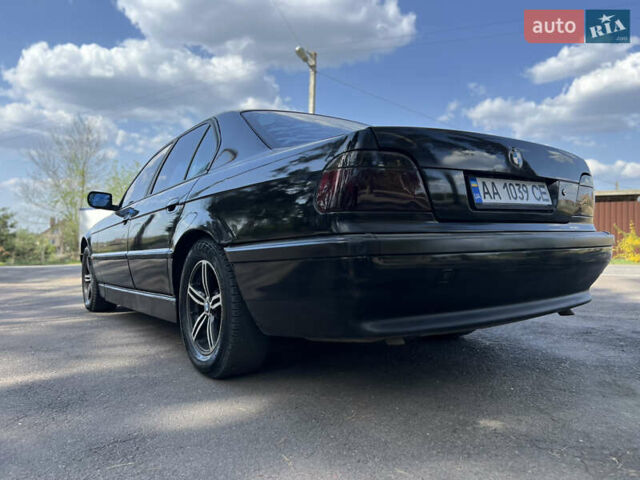 Чорний БМВ 7 Серія, об'ємом двигуна 4.4 л та пробігом 400 тис. км за 3850 $, фото 14 на Automoto.ua