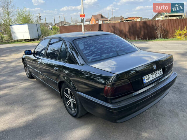 Чорний БМВ 7 Серія, об'ємом двигуна 4.4 л та пробігом 400 тис. км за 3850 $, фото 16 на Automoto.ua