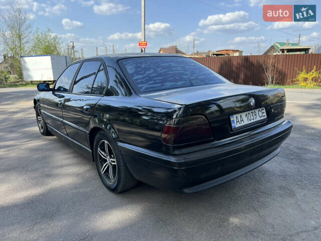 Чорний БМВ 7 Серія, об'ємом двигуна 4.4 л та пробігом 400 тис. км за 3850 $, фото 15 на Automoto.ua