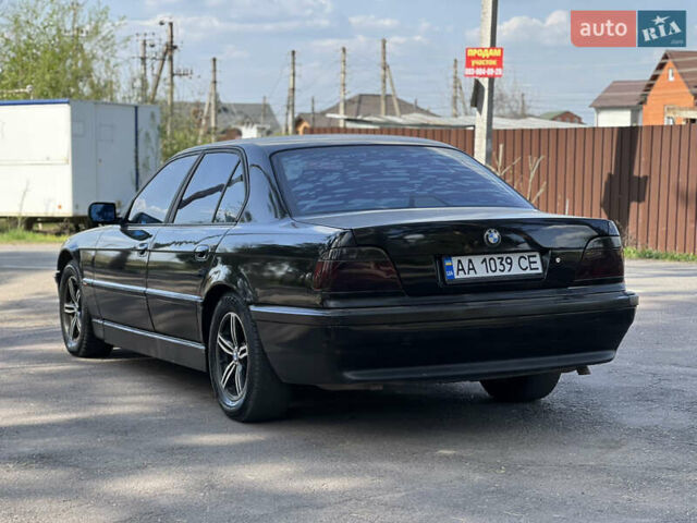 Чорний БМВ 7 Серія, об'ємом двигуна 4.4 л та пробігом 400 тис. км за 3850 $, фото 10 на Automoto.ua