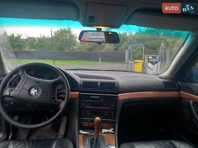 Черный БМВ 7 Серия, объемом двигателя 2.8 л и пробегом 300 тыс. км за 7500 $, фото 13 на Automoto.ua