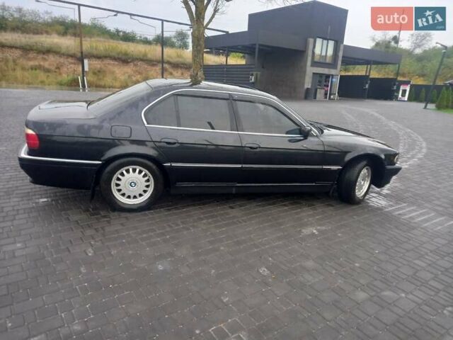 Черный БМВ 7 Серия, объемом двигателя 2.8 л и пробегом 300 тыс. км за 7500 $, фото 6 на Automoto.ua