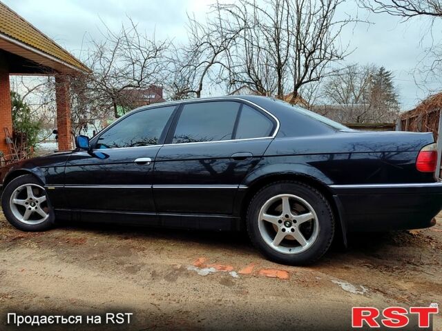 Черный БМВ 7 Серия, объемом двигателя 3.5 л и пробегом 365 тыс. км за 4000 $, фото 5 на Automoto.ua